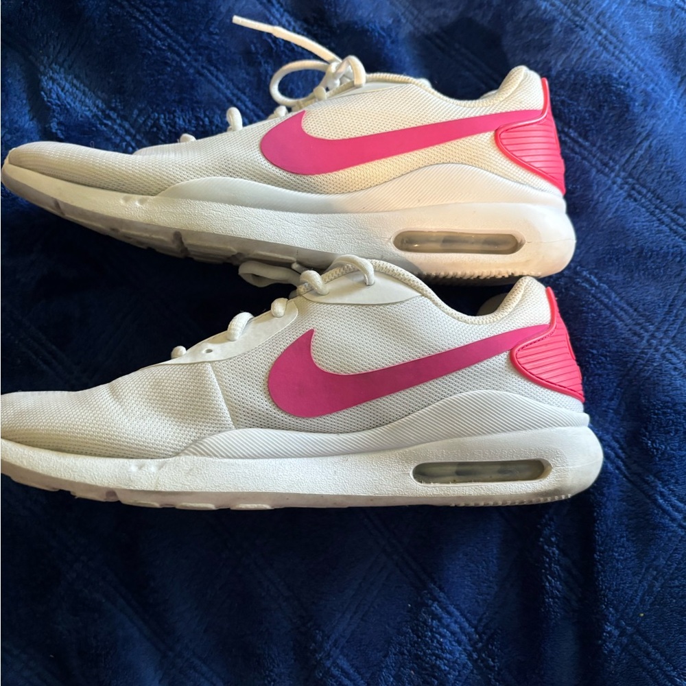 Nike Air size 9.5 women’s white shoes with a pink swoosh